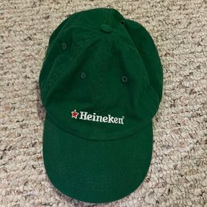 Heineken green hat.